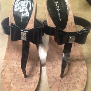 Black wedge sandals.